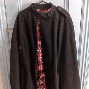 Stylish Black woman's Cape with Red Patterned Lining